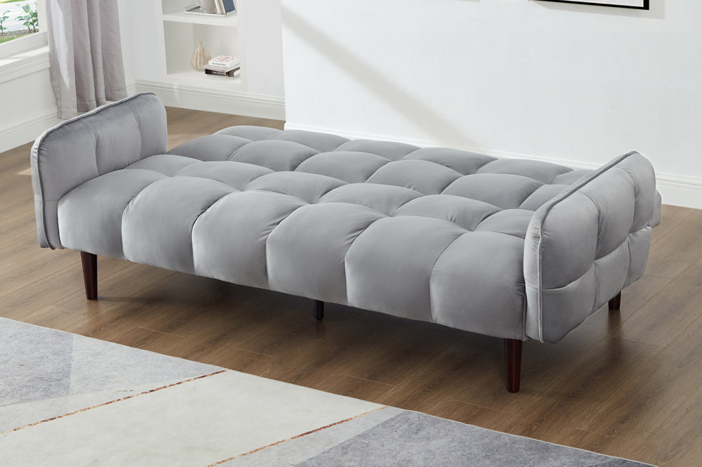 Grey tufted velvet convertible sofa bed with space-saving design