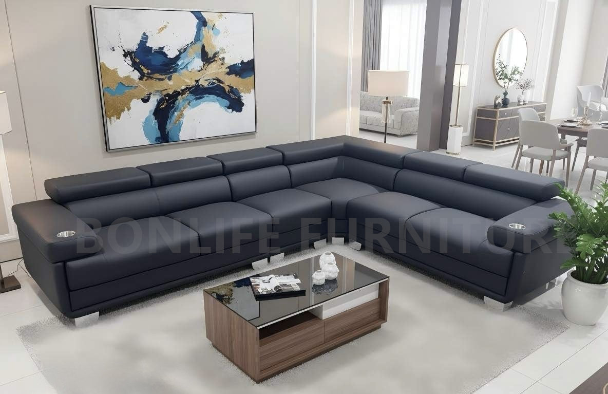 Black PU leather reversible sectional sofa with adjustable backrest, wireless charging and cup holders
