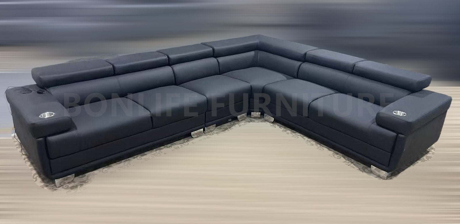 Front view black PU leather reversible sectional sofa in modern living room
